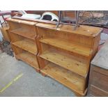 A pair of 3' 2" Ducal polished pine three shelf open waterfall bookcases with moulded decoration,