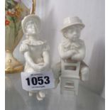 A Royal Worcester blanc de chine figure of a girl on a stool - sold with an unmarked boy similar -