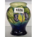 A 1930's - 1940's Moorcroft Anemone pattern vase with stamped and painted marks to base - crazed
