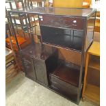 A 3' 5 1/2" Chinese lacquered rosewood display stand with stepped shelves, two drawers, gallery