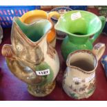 Five assorted pottery jugs including majolica fish gurgle, Shelley Harmony, etc.