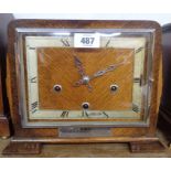 A 1930's polished oak cased mantel clock with Enfield eight day gong striking movement -