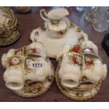 A Royal Albert Celebration pattern part tea set comprising eight trios, milk and sugar, and bread