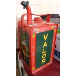 A vintage Valor paraffin can later painted in the bargeware style