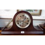 A large polished mahogany cased Napoleon hat mantel clock with eight day chiming movement - bezel