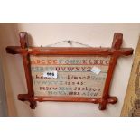 A small chamfered wooden framed embiordered alphabet sampler - Mary Jane Jackson, 1885