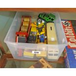 Box of die cast cars and other vehicles