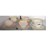 A quantity of Belleek shell and coral pattern tea ware including a trio - various patterns