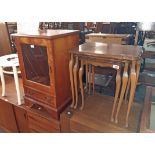 A nest of three polished mixed wood tea tables - sold with a yew effect media cabinet with