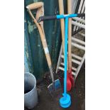 A long handled shovel, post hole digger and a fence post auger
