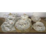 A Meissen cabaret tea set comprising teapot, sucrier, milk jug, two trios, two plates, salt and