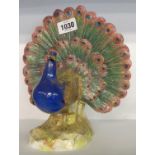 A 20th Century Meissen porcelain figurine of a peacock - a/f