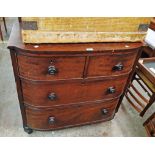 A 3' 1" Victorian break bow front chest of two short and two long graduated drawers, set on turned