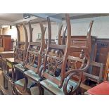 A set of six reproduction mahogany lyre back scroll elbow chairs with upholstered drop-in seats, set