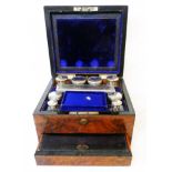 An S. Woolfield & Co Glasgow gentleman's travelling toilet box with fitted interior bottles and jars