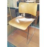 A mid Century chrome and laminated wood panel back stacking chair - some chips to seat front