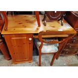 A 36" modern pine single pedestal student's computer desk with pull-out slide and cupboard, set on