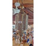 A pierced eastern brass hanging lantern