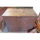 A 3' 2" 19th Century oak mule chest with carved incised decoration, internal candle box and two