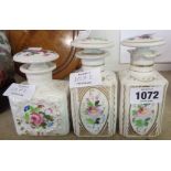Three 19th Continental porcelain dressing table perfume bottles hand painted with roses - one a/f