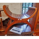 A stained Eastern hardwood X-frame dressing stool in the Italian style with slatted sides