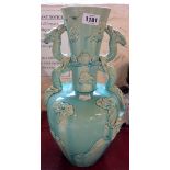 A large Chinese turquoise lead glazed vase decorated with dragon handles - a/f