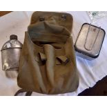A military canvas shoulder bag containing an MMS 1945 food container, rifle cleaning kit and US