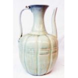 A 11 3/4" antique Chinese celadon ewer of pumpkin form with slender spout