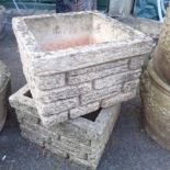 A pair of Sandford Stone concrete square brick pattern planters