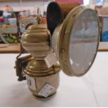A vintage aceteline bicycle lamp - crack to lens