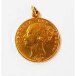An 1866 gold sovereign with soldered loop as a pendant