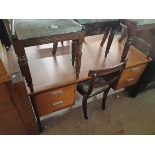 A 4' 5 1/2" 20th Century teak effect knee-hole office desk with four flanking drawers, set on