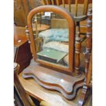 A Victorian platform dressing table mirror with arched plate and serpentine base - for re-polishing