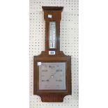 A 20th Century Wilson polished walnut cased barometer/thermometer with printed metal square dial and