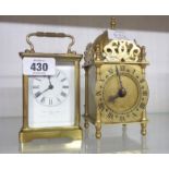 A vintage brass and bevelled glass case carriage timepiece with dial marked for Collingwood & Son,
