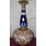 A Doulton Slater's Patent onion vase decorated with enameled lace pattern to body with blue and