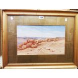 A gilt framed and slipped early 20th Century watercolour depicting an Egyptian landscape,