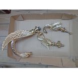 A box containing a 22ct. gold plated bathroom tap suite of swan neck and wing form