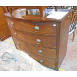 A 4' 1" Regency mahogany and ebony strung break bow front chest of two short and three long