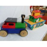 A wooden John Crane childs ride on train - sold with a modern wooden toy Noah's Ark and contents