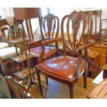 A set of six 1920's Georgian style mahogany framed fan back dining chairs with decorative pierced