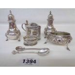 A pair of Mappin & Webb silver Georgian style pepperettes - sold with a late Georgian silver salt,