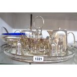 A hotel plate tea set, egg cruet, caster and bowl on ceramic base tray