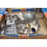 A box containing a quantity of silver plated and pewter items including lidded dish, jugs and trophy