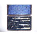 A cased set of drawing instruments