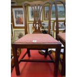 Three matching antique mahogany framed Chippendale style standard dining chairs with pierced splat