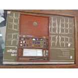 A selection of artist's materials including Landseer student's watercolour box with ceramic