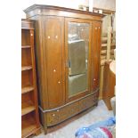 A 4' 11" late 19th Century mahogany and ebonised strung bow front wardrobe with moulded cornice