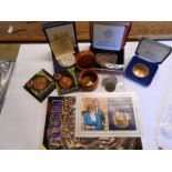 A quantity of commemorative coins, Avery weights, etc.