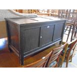 A 3' 5 1/4" 20th Century stained pine and mixed wood three panel linen chest